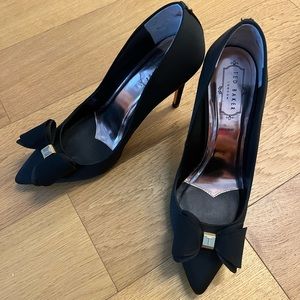 Ted Baker. Black pumps. Size 9. Bow tie on toe.